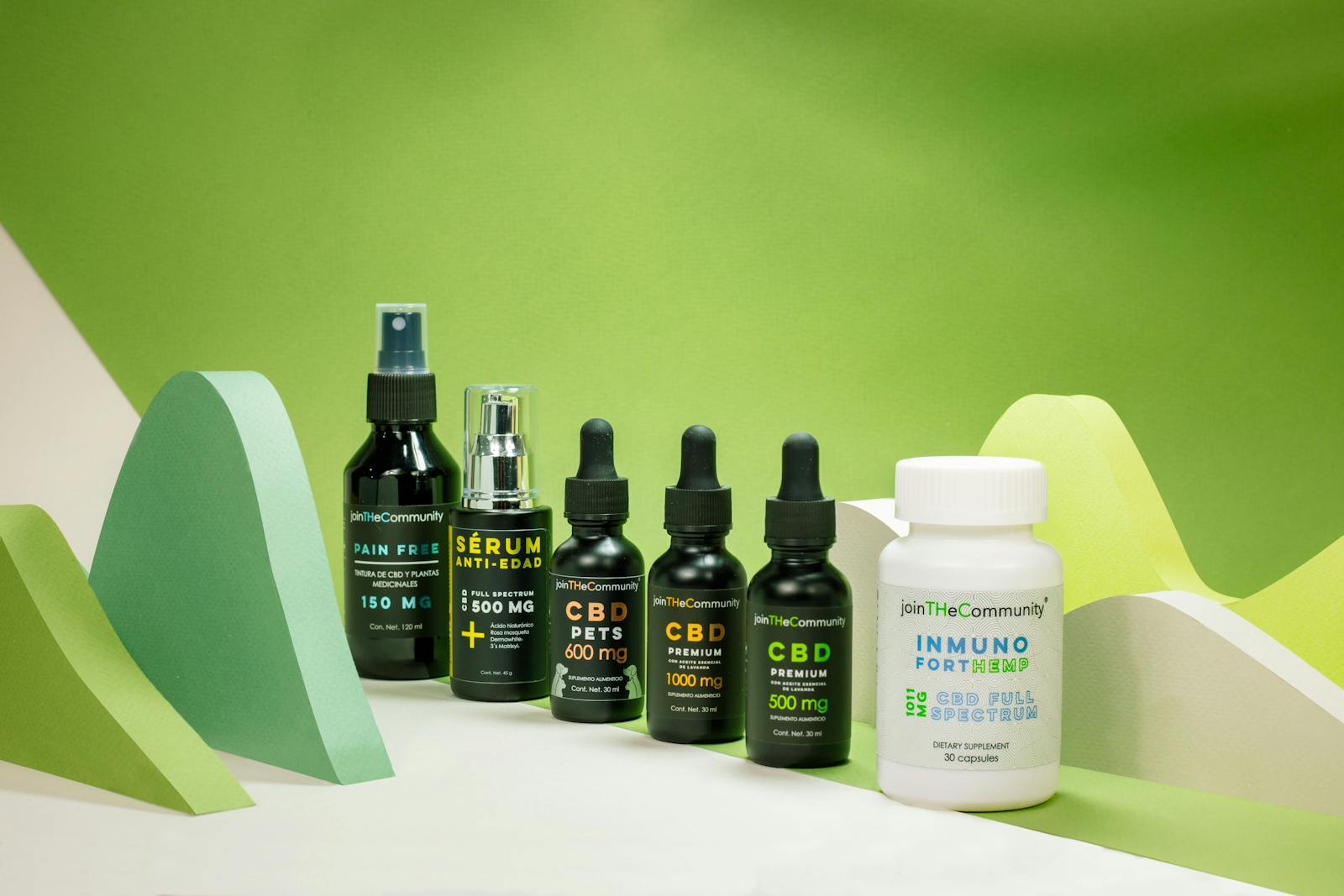 CBD product lineup with abstract green shapes, featuring oils and supplements.